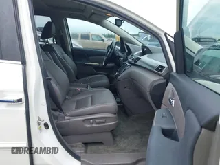 2016 Honda Odyssey EX-L z VIN 5FNRL5H61GB030771, wystawiony jako IAAI lot #42459561 z przebiegiem 130 541 mil mil oraz . Historia ofert i sprzedaży dostępna na DreamBid. Obrazek 5.
