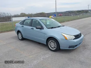 2009 Ford Focus SE with VIN 1FAHP35N59W157060, listed as a IAAI auction lot 41871757 with 141,558 mi miles. Bid and sale history available at carsss.com. Image 1.
