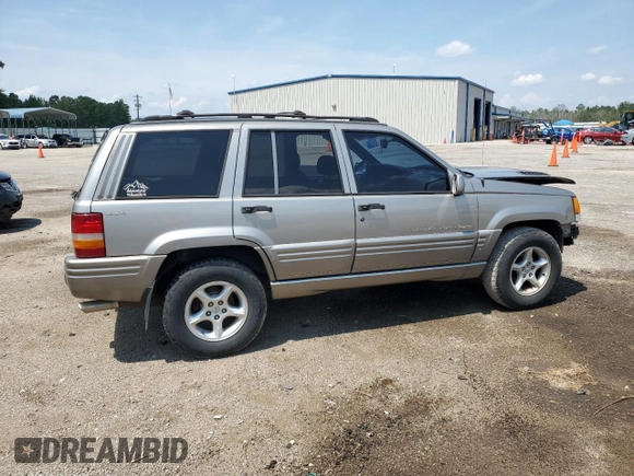 1998 Jeep Grand Cherokee Limited with VIN 1J4GZ88Z9WC148445, listed as a Copart auction lot 65961744 with 180,067 mi miles and Clean Title. Bid and sale history available at carsss.com. Image 3.