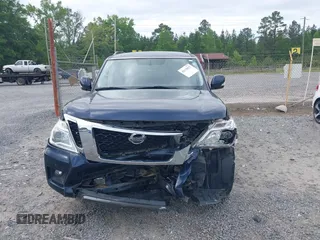 2019 Nissan Armada SL z VIN JN8AY2NDXK9090524, wystawiony jako IAAI lot #42138072 z przebiegiem 159 578 mil mil oraz . Historia ofert i sprzedaży dostępna na DreamBid. Obrazek 13.