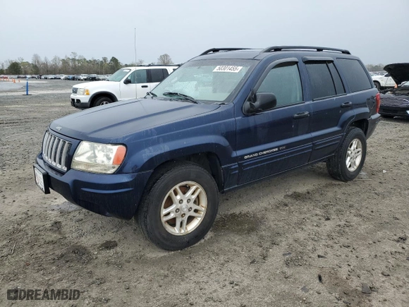 2004 Jeep Grand Cherokee Laredo with VIN 1J4GX48S64C165105, listed as a Copart auction lot 50301455 with 299,686 mi miles and Salvage Title. Bid and sale history available at carsss.com. Image 1.