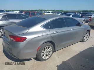 2015 Chrysler 200 Limited with VIN 1C3CCCAB1FN656181, listed as a IAAI auction lot 42011014 with 293,897 mi miles. Bid and sale history available at carsss.com. Image 4.
