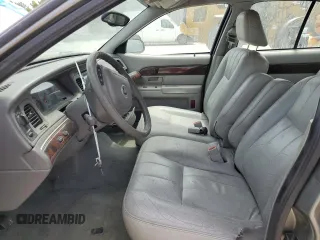 2004 Mercury Grand Marquis LS Premium z VIN 2MEFM75W34X688862, wystawiony jako Copart lot #56801635 z przebiegiem 150 371 mil mil oraz Szkody całkowita. Historia ofert i sprzedaży dostępna na DreamBid. Obrazek 7.