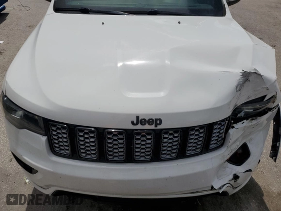 2019 Jeep Grand Cherokee Laredo E with VIN 1C4RJEAG4KC816725, listed as a Copart auction lot 64466815 with 84,763 mi miles and Salvage title. Bid and sale history available at DreamBid. Image 12.
