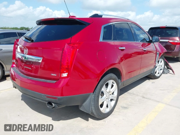 2015 Cadillac SRX Premium Collection with VIN 3GYFNDE35FS569153, listed as a IAAI auction lot 42540914 with 139,823 mi miles and . Bid and sale history available at DreamBid. Image 4.