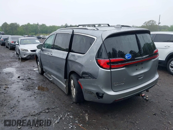 2021 Chrysler Pacifica Touring L z VIN 2C4RC1BG7MR591356, wystawiony jako IAAI lot #42256765 z przebiegiem 32 653 mil mil oraz . Historia ofert i sprzedaży dostępna na DreamBid. Obrazek 3.