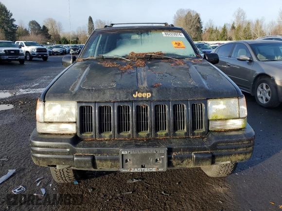 1998 Jeep Grand Cherokee Limited with VIN 1J4GZ78S0WC138917, listed as a Copart auction lot 86223974 with 152,482 mi miles and Clean title. Bid and sale history available at DreamBid. Image 5.