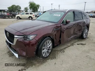 2024 Mazda CX-90 Premium z VIN JM3KKDHD8R1113467, wystawiony jako Copart lot #59140195 z przebiegiem 10 267 mil mil oraz Szkody całkowita. Historia ofert i sprzedaży dostępna na DreamBid. Obrazek 1.
