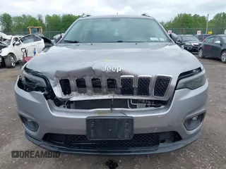 2019 Jeep Cherokee Latitude Plus z VIN 1C4PJMLB9KD287978, wystawiony jako IAAI lot #42228505 z przebiegiem 207 539 mil mil oraz . Historia ofert i sprzedaży dostępna na DreamBid. Obrazek 6.