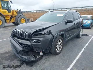 2014 Jeep Cherokee Latitude with VIN 1C4PJLCS2EW217130, listed as a IAAI auction lot 41782039 with 129,080 mi miles. Bid and sale history available at carsss.com. Image 18.