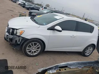 2014 Chevrolet Sonic LT with VIN 1G1JC6SB2E4215465, listed as a IAAI auction lot 41140292 with 93,224 mi miles. Bid and sale history available at carsss.com. Image 14.
