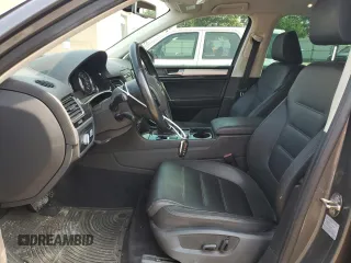 2015 Volkswagen Touareg Lux с VIN WVGEP9BP2FD004595, выставлен на аукционе Copart как лот 59020375 с пробегом 135 319 миль миль и Списание • Salvage title. История ставок и продаж доступна на DreamBid. Изображение 7.