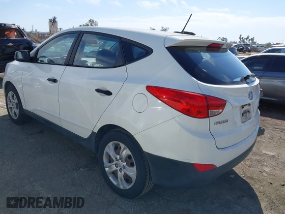 2010 Hyundai Tucson GLS with VIN KM8JT3AC7AU020547, listed as a IAAI auction lot 42014150 with 106,559 mi miles and . Bid and sale history available at DreamBid. Image 3.