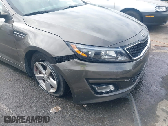 2015 Kia Optima LX with VIN 5XXGM4A72FG400848, listed as a IAAI auction lot 40802198 with 173,270 mi miles and . Bid and sale history available at DreamBid. Image 6.