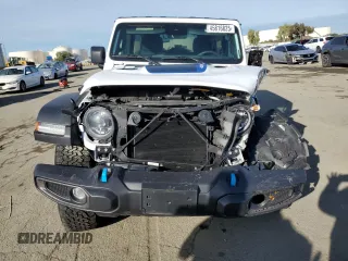 2024 Jeep Wrangler Rubicon with VIN 1C4RJXR6XRW115879, listed as a Copart auction lot 45816825 with 34,557 mi miles and Salvage Title. Bid and sale history available at DreamBid. Image 5.