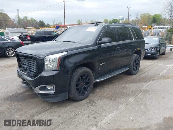 2017 GMC Yukon SLT with VIN 1GKS1BKC2HR128308, listed as a IAAI auction lot 41945770 with 158,905 mi miles. Bid and sale history available at carsss.com. Image 2.