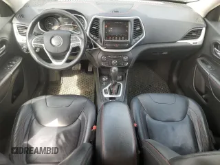 2015 Jeep Cherokee Trailhawk with VIN 1C4PJMBB1FW630715, listed as a Copart auction lot 58559675 with 58,302 mi miles and Salvage title. Bid and sale history available at DreamBid. Image 8.