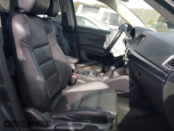 2016 Mazda CX-5 Grand Touring z VIN JM3KE4DY5G0836891, wystawiony jako IAAI lot #41441065 z przebiegiem 120 808 mil mil oraz . Historia ofert i sprzedaży dostępna na DreamBid. Obrazek 5.