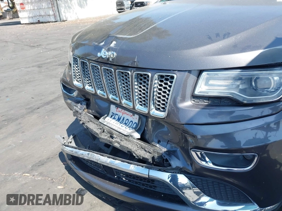 2014 Jeep Grand Cherokee Summit with VIN 1C4RJFJG8EC434899, listed as a IAAI auction lot 42399912 with 186,840 mi miles and . Bid and sale history available at DreamBid. Image 6.
