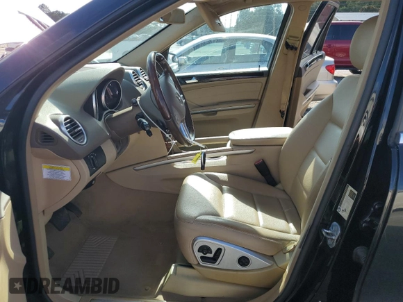 2011 Mercedes-Benz M 350 with VIN 4JGBB2FB5BA744077, listed as a Copart auction lot 61565615 with 125,813 mi miles and Salvage title. Bid and sale history available at DreamBid. Image 7.