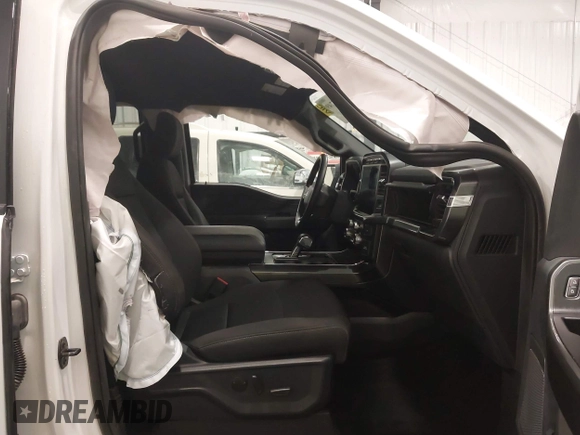 2023 Ford F-150 XL z VIN 1FTFW1E85PFA54558, wystawiony jako IAAI lot #42215749 z przebiegiem 22 476 mil mil oraz . Historia ofert i sprzedaży dostępna na DreamBid. Obrazek 5.