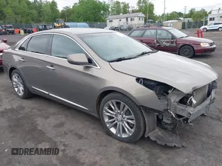 2019 Cadillac XTS Luxury z VIN 2G61M5S34K9136818, wystawiony jako IAAI lot #42274891 z przebiegiem 74 882 mil mil oraz . Historia ofert i sprzedaży dostępna na DreamBid. Obrazek 1.