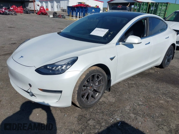 2020 Tesla Model 3 Standard Range Plus with VIN 5YJ3E1EA7LF797150, listed as a IAAI auction lot 41869088 with 75,708 mi miles and . Bid and sale history available at carsss.com. Image 17.
