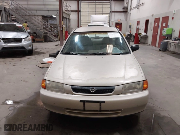 1998 Mazda Protege DX z VIN JM1BC1419W0171802, wystawiony jako IAAI lot #42202861 z przebiegiem 252 304 mil mil oraz . Historia ofert i sprzedaży dostępna na DreamBid. Obrazek 12.