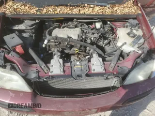 2004 Chevrolet Venture LS z VIN 1GNDX03E34D232151, wystawiony jako Copart lot #77205384 z przebiegiem 151 035 mil mil oraz Szkoda całkowita • Salvage title. Historia ofert i sprzedaży dostępna na DreamBid. Obrazek 13.