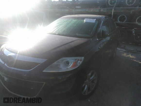 2011 Mazda CX-9 Touring with VIN JM3TB2CA7B0330879, listed as a IAAI auction lot 40628534 with 159,256 mi miles and . Bid and sale history available at DreamBid. Image 2.