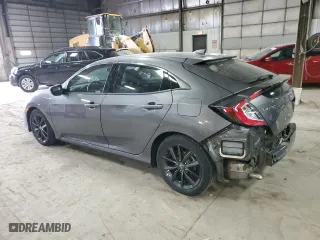 2021 Honda Civic Hatchback EX with VIN SHHFK7H60MU213610, listed as a Copart auction lot 52009725 with 53,595 mi miles and Salvage Title. Bid and sale history available at carsss.com. Image 2.