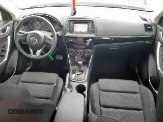 2014 Mazda CX-5 Touring z VIN JM3KE2CY7E0308580, wystawiony jako Copart lot #60565835 z przebiegiem 92 708 mil mil oraz Szkoda całkowita • Salvage title. Historia ofert i sprzedaży dostępna na DreamBid. Obrazek 8.