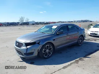 2013 Ford Taurus SHO с VIN 1FAHP2KT0DG220825, выставлен на аукционе IAAI как лот 41851095 с пробегом 163 797 миль миль и . История ставок и продаж доступна на DreamBid. Изображение 20.