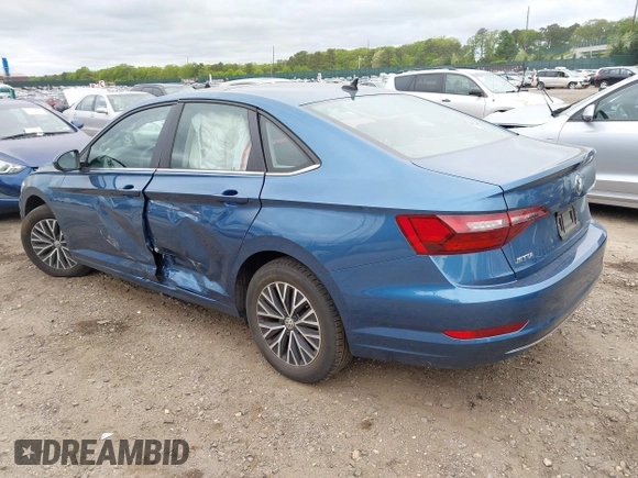 2021 Volkswagen Jetta S z VIN 3VWC57BU1MM070677, wystawiony jako IAAI lot #42312226 z przebiegiem 53 808 mil mil oraz . Historia ofert i sprzedaży dostępna na DreamBid. Obrazek 3.