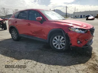 2016 Mazda CX-5 Touring with VIN JM3KE2CY9G0807478, listed as a Copart auction lot 47393775 with 105,034 mi miles and Salvage Title. Bid and sale history available at carsss.com. Image 4.