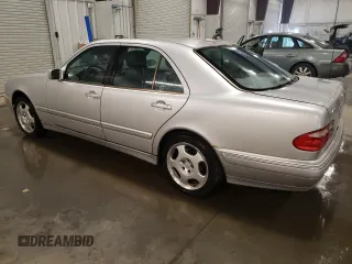 2001 Mercedes-Benz E 320/430 4 Matic with VIN WDBJF83J31X057905, listed as a Copart auction lot 50656425 with 155,217 mi miles and Salvage Title. Bid and sale history available at DreamBid. Image 2.