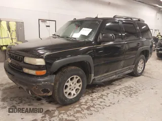 2004 Chevrolet Tahoe LS with VIN 1GNEK13T24R242907, listed as a IAAI auction lot 41496795 with 261,402 mi miles. Bid and sale history available at carsss.com. Image 2.