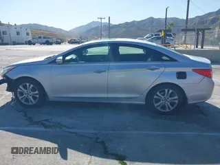 2011 Hyundai Sonata Limited z VIN 5NPEC4ACXBH175889, wystawiony jako IAAI lot #42387391 z przebiegiem 227 660 mil mil oraz . Historia ofert i sprzedaży dostępna na DreamBid. Obrazek 15.