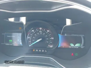 2016 Ford Fusion Titanium with VIN 3FA6P0SU1GR304590, listed as a IAAI auction lot 42381545 with 136,684 mi miles and . Bid and sale history available at DreamBid. Image 7.
