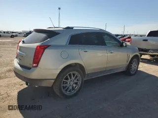 2015 Cadillac SRX Premium Collection with VIN 3GYFNDE32FS536692, listed as a Copart auction lot 54669175 with 80,484 mi miles and Salvage title. Bid and sale history available at DreamBid. Image 3.