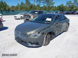 2017 Lincoln Continental Select with VIN 1LN6L9TK1H5617355, listed as a IAAI auction lot 40404909 with 108,208 mi miles. Bid and sale history available at carsss.com. Image 2.