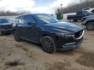 2017 Mazda CX-5 Grand Touring with VIN JM3KFBDL2H0197831, listed as a Copart auction lot 43150335 with 126,847 mi miles and Salvage Title. Bid and sale history available at carsss.com. Image 4.