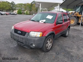2004 Ford Escape XLT with VIN 1FMYU93114KB05975, listed as a IAAI auction lot 41929538 with 161,461 mi miles. Bid and sale history available at carsss.com. Image 2.