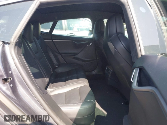 2019 Tesla Model S 75D with VIN 5YJSA1E25KF304371, listed as a IAAI auction lot 42349856 with 64,788 mi miles and . Bid and sale history available at DreamBid. Image 8.