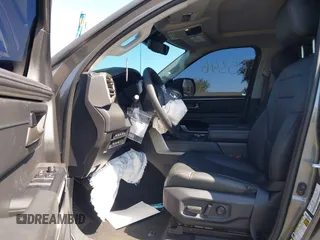 2024 Toyota Tundra Limited Hybrid with VIN 5TFWC5DB5RX059978, listed as a IAAI auction lot 42265346 with 16,882 mi miles and . Bid and sale history available at DreamBid. Image 5.