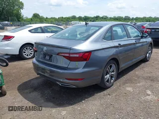 2021 Volkswagen Jetta S with VIN 3VWC57BU1MM047089, listed as a IAAI auction lot 42566747 with 80,639 mi miles and . Bid and sale history available at DreamBid. Image 4.