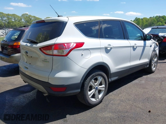 2015 Ford Escape SE with VIN 1FMCU0G97FUB08702, listed as a IAAI auction lot 42045471 with 190,782 mi miles and . Bid and sale history available at DreamBid. Image 4.