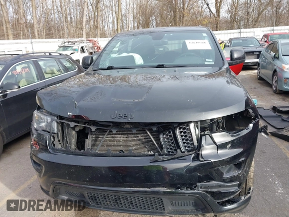 2017 Jeep Grand Cherokee Laredo with VIN 1C4RJFAG7HC873211, listed as a IAAI auction lot 40849066 with 139,430 mi miles. Bid and sale history available at carsss.com. Image 12.