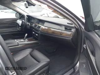 2012 BMW 7 Series 740i with VIN WBAKA4C52CC613676, listed as a IAAI auction lot 42509312 with 113,971 mi miles and . Bid and sale history available at DreamBid. Image 5.