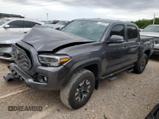 2023 Toyota Tacoma SR z VIN 3TYCZ5AN9PT131515, wystawiony jako Copart lot #57900865 z przebiegiem Nie podano mil oraz Szkoda całkowita • Salvage title. Historia ofert i sprzedaży dostępna na DreamBid. Obrazek 1.
